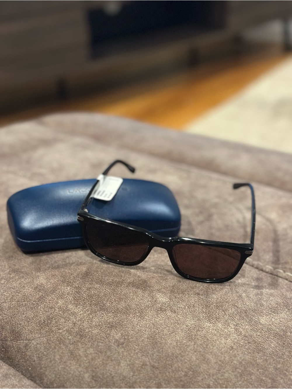 Lacoste Black Frame Brown Lens Sunglasses with Blue Case